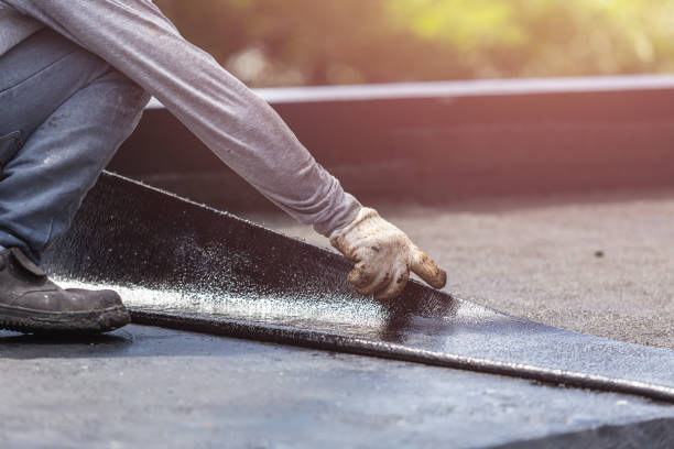 Professional Basement Waterproofing technician working in Elmore, OH